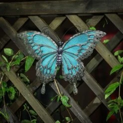 LuxenHome Blue Butterfly Glass And Metal Outdoor Wall Decor