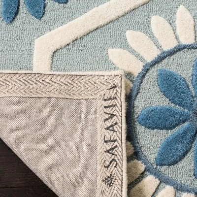 Holly Floral Tufted Area Rug - Safavieh - Image 2